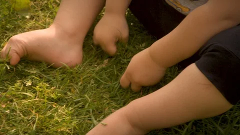 BOY playing on GRASS Stock Footage 89781782