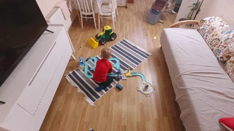 Boy Playing At Home Surveillance Camera Video stock 167357280