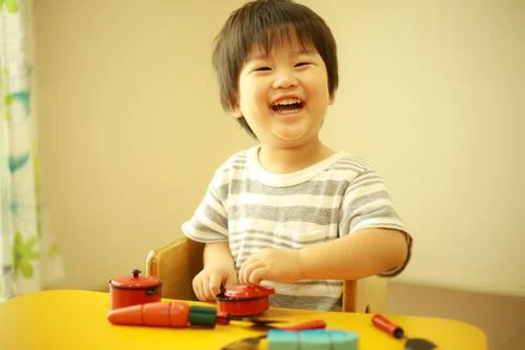 Boy playing house Stock Photos