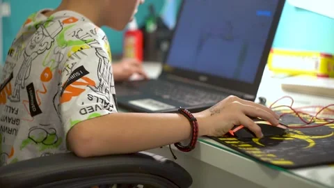 Boy playing on laptop close-up Stock Footage 255802955