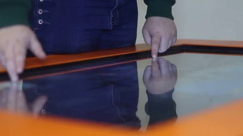 Boy playing on a large tablet Stock Footage 81790240