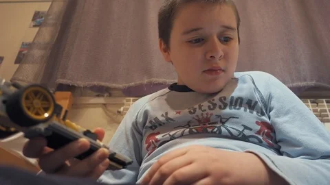 Boy playing with Lego blocks Stock Footage 73057239