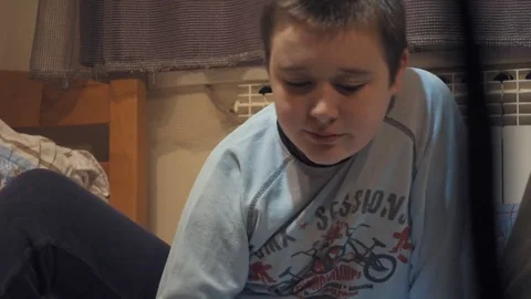Boy playing with Lego blocks Vídeo Stock 73057878
