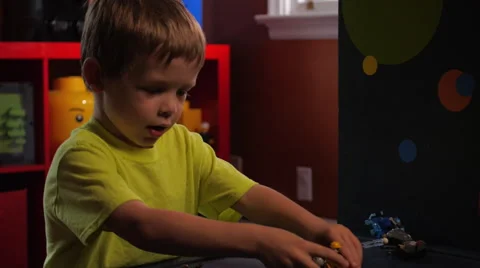 Boy playing with Lego building blocks #5 Stock Footage 63397320