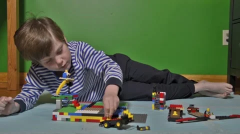 Boy playing with Lego Stock Footage 46969891