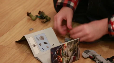 Boy playing with Lego Stock Footage 48026876