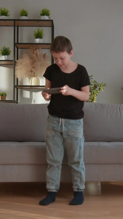 Boy Playing Mobile Game Stock Footage 335484340