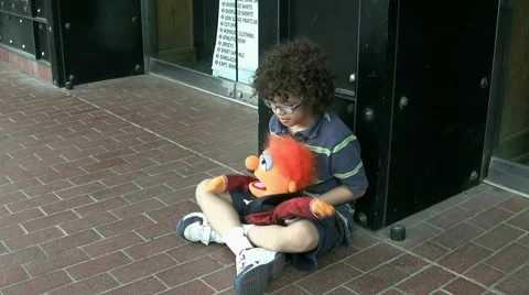 Boy Playing With Muppet Video stock 1218512