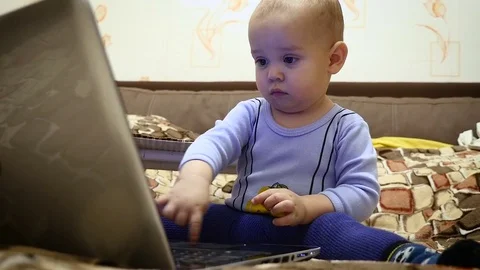 Boy Playing with noteboock Stock Footage 72664939