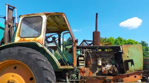 Boy playing on old tractor 스톡 동영상 51396163