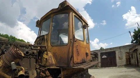 Boy playing on old tractor Stock-Footage 51396203