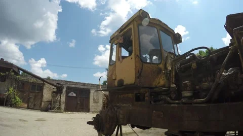 Boy playing on old tractor Stock Footage 51396218