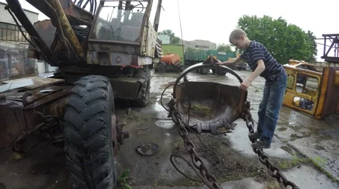 Boy playing on old tractor Video stock 51396260