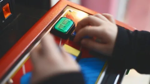 A boy is playing an old video game Stock Footage 123172786