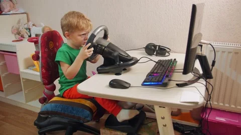 The Boy Playing Online Racing Stock Footage 168693511