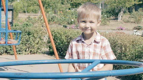 Boy playing outdoor at playground Stock Footage 68041161