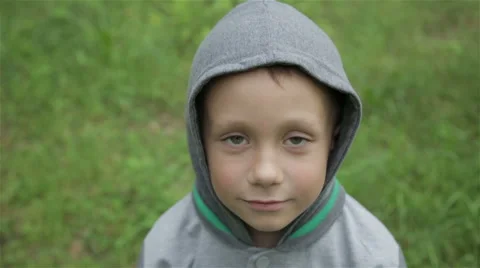 Boy playing outdoors Stock Footage 64608764