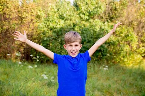 Boy playing in a park Stock Photos
