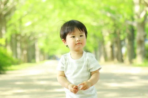 Boy playing in the park Foto stock