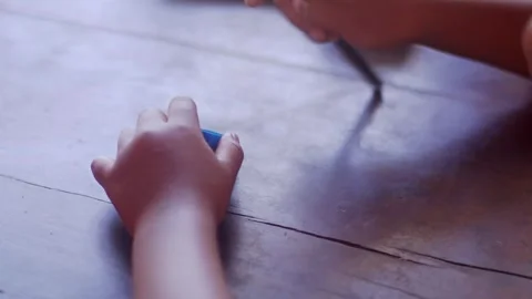 Boy playing with Pencil while Studying Stock Footage 243254555