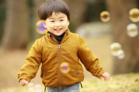 Boy playing Foto stock