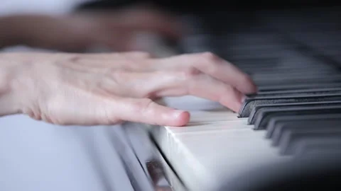 Boy is playing the piano 9 Stock Footage 310027004