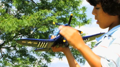 Boy Playing with Plane Series IX HD Stock Footage 40714558