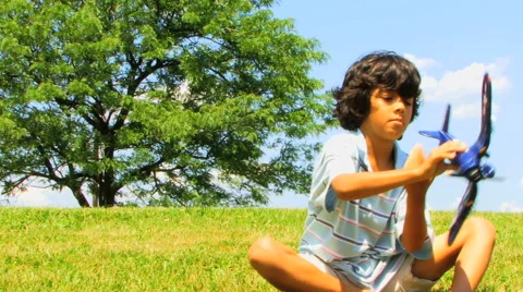 Boy Playing with Plane Series V HD Stock Footage 40714237