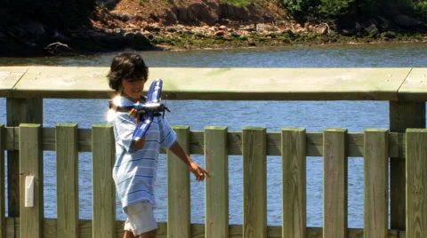 Boy Playing with Plane Series VI HD Stock Footage 40714241