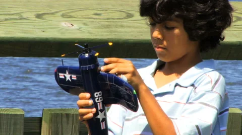 Boy Playing with Plane Series VIII HD Video stock 40714654