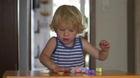 Boy Playing With Plasticine 스톡 동영상 54446773