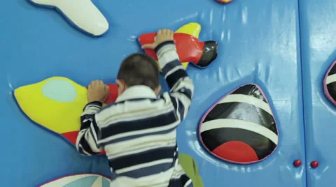 Boy playing on the playground Stock Footage 33352922