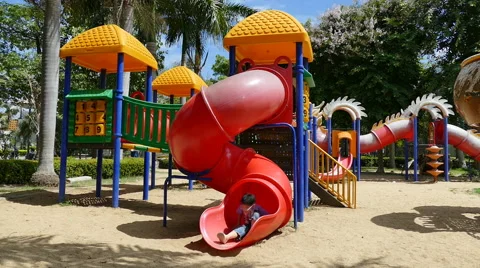 Boy playing on playground Stock Footage 53047221