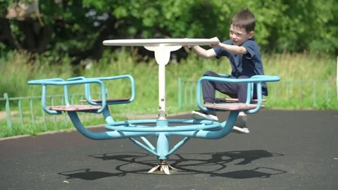 The boy is playing on the playground. Stock Footage 344811585