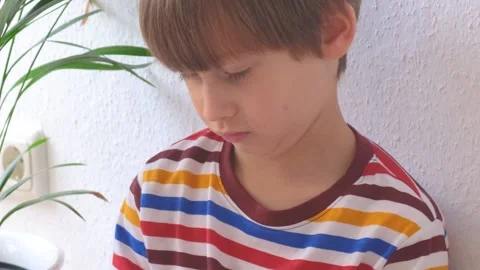 Boy playing pop it. Close-up Stock Footage 223108542