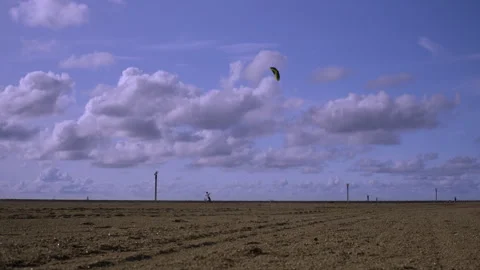 Boy playing with powerkite on the beach Stock Footage 285132129