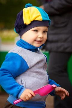 Boy playing in sandbox Stock Photos