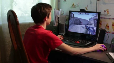 Boy Playing in Shooter Computer Game Stock Footage 52230184