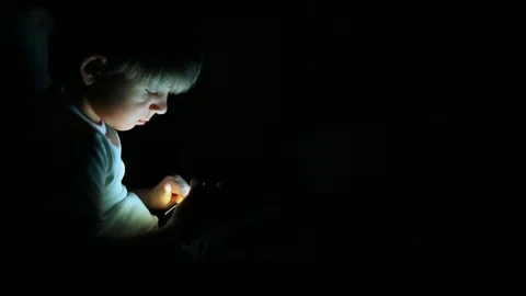Boy playing with smart phone Stock Footage 102801160