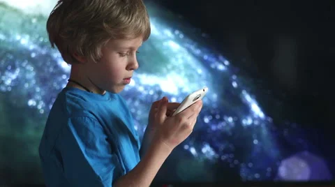 Boy playing with smartphone. Close up Stock Footage 46904451