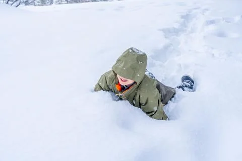 A boy playing in snow. forest. Winter holiday concept. Special filter, sele.. Stock Photos