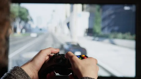 Boy Playing Some Video Games At Home Using A Controller 스톡 동영상 106378973