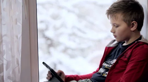 Boy,  playing on tablet Stock Footage 59946104