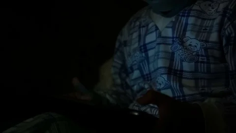 Boy playing on the tablet Stock Footage 75614055