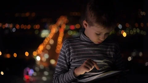 Boy playing on a tablet Stock Footage 95168091