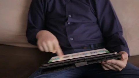Boy playing on a tablet.Full hd video Vídeos de archivo 71738207