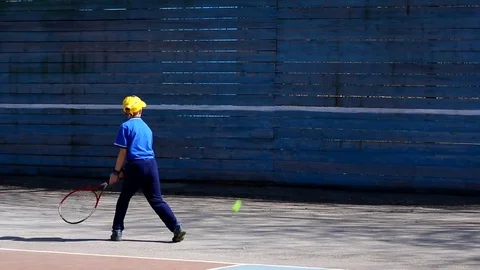 Boy playing tennis Stock Footage 75034739