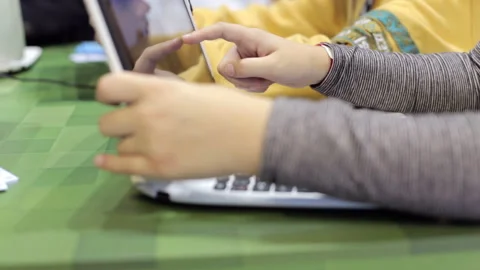 Boy playing on touch notebook Stock Footage 90701193