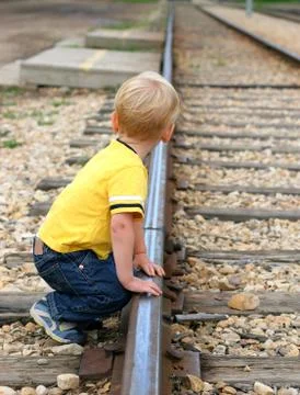Boy playing on track Stock Photos