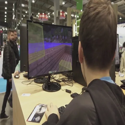 Boy playing  video game on a big screen. Stock Footage 69655974